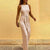Damen Jumpsuit Festlich Mit Offenen Schultern Glitzerstoff 1