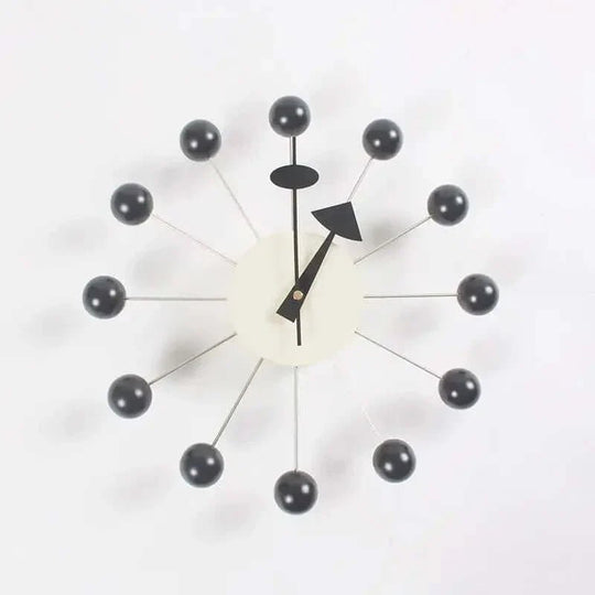 Moderne Wanduhr im Sonnenschliff-Design für stilvolle Akzente 6