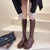 Lange Damenstiefel