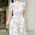 Hose mit weitem Bein und Kunstmuster im Neckholder-Stil