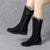 Hohe Pelzstiefel für Frauen
