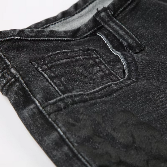 Denim-Hose mit niedriger Taille und Blumendruck